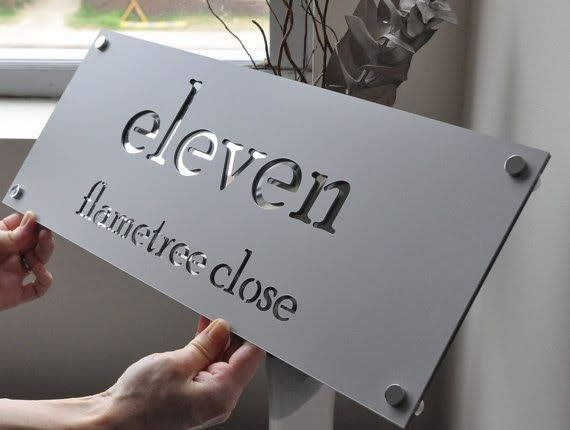 Laser-cut metal house name plate
